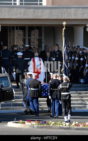 061229-N-9909C-003 Palm Desert, Calif. (Dec. 29, 2006) Ð Members of the Armed Forces Honor Guard bear the casket of former President Gerald R. Ford into St. Margaret's Episcopal Church in Palm Desert, Calif., Dec. 29, 2006.  The former First Lady Betty Ford, escorted by U.S. Army Maj. Gen. Guy C. Swan III, look on from the church steps along with other friends and family members. DoD personnel are helping to honor Ford, the 38th president of the United States, who passed away on Dec. 26th. Following services in California, Ford's remains will be flown to Washington, D.C., for a state funeral i Stock Photo