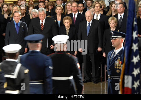 061230-D-1142M-014 Washington, D.C. (Dec. 30, 2006) - Former First Lady Betty Ford, center, accompanied on the right by Vice President Richard B. Cheney and his wife Lynne, at right, and to the left by Speaker of the House J. Dennis Hastert and Senate President Pro Tempore Ted Stevens, watch as the Armed Forces Honor Guard depart the Rotunda of the U.S. Capitol, following a memorial service for former President Gerald R. Ford, The 38th president, who served from 1974 to 1977, died at his California home Dec. 26 at age 93. A private interment service is scheduled for Jan. 3 at the Gerald R. For Stock Photo