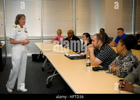 100323-N-2389S-001 PHOENIX (March 23, 2010) Rear Adm. Robin Graf, deputy commander of Navy Recruiting Command, discusses the U.S. Navy maritime strategy with military division employees at the University of Phoenix. Graf is taking part in Phoenix Navy Week, one of 20 Navy Weeks planned across America for 2010. Navy Weeks are designed to show Americans the investment they have made in their Navy and increase awareness in cities that do not have a significant Navy presence. (U.S. Navy photo by Mass Communication Specialist 2nd Class Kat Smith/Released) US Navy 100323-N-2389S-001 Rear Adm. Robin  Stock Photo
