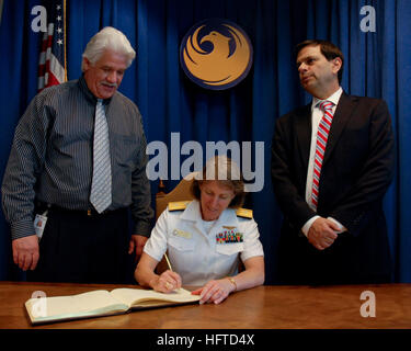 100324-N-2389S-072 PHOENIX, Ariz. (March 24, 2010) Rear Adm. Robin Graf, deputy commander of Navy Recruiting Command, signs the official guest ledger Phoenix, Ariz. while visiting Mayor Phil Gordon, right, and Councilman Claude Mattox. Phoenix is one of 20 Navy Weeks planned across America for 2010. Navy Weeks show Americans the investment they have made in their Navy and increase awareness in cities that do not have a significant Navy presence. (U.S. Navy photo by Mass Communication Specialist 2nd Class Kat Smith/Released) US Navy 100324-N-2389S-072 Rear Adm. Robin Graf, deputy commander of N Stock Photo