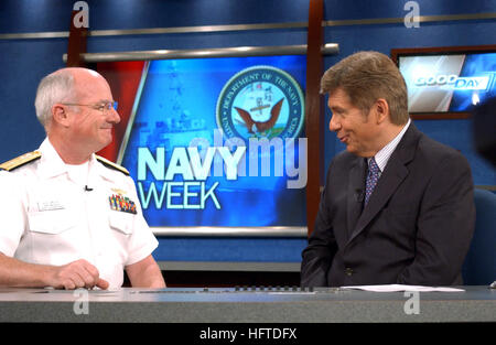 070120-N-0318S-001  Tampa, Fla. (Jan. 20, 2007) - Deputy Vice Cmdr., Naval Air Systems Command, Rear Adm. Richard J. Wallace, talks with Mr. Bill Murphy, host for Fox News 13 Good Day Tampa Bay morning show about Tampa Navy Week. Tampa Navy Week is being held in conjunction with the annual Tampa Bay Gasparilla Pirate Festival. Tampa Navy Week is one of 26 Navy Weeks planned across America in 2007 designed to show Americans the investment they have made in their Navy and increase awareness in cities that do not have a significant everyday Navy presence. U.S. Navy photo by Mass Communication Spe Stock Photo