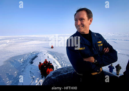 070318-N-3642E-343  ARCTIC OCEAN (March 18, 2007) Ð Commander, Submarine Force, Vice Adm. John Donnelly looks over the frozen Arctic Ocean from the bridge of attack submarine USS Alexandria (SSN 757). Alexandria surfaced through three feet of ice during ICEX-07, a U.S. Navy and Royal Navy exercise being conducted on and under a drifting ice floe about 180 nautical miles off the north coast of Alaska. U.S. Navy photo by Chief Mass Communication Specialist Shawn P. Eklund (RELEASED) US Navy 070318-N-3642E-343 Commander, Submarine Force, Vice Adm. John Donnelly looks over the frozen Arctic Ocean  Stock Photo