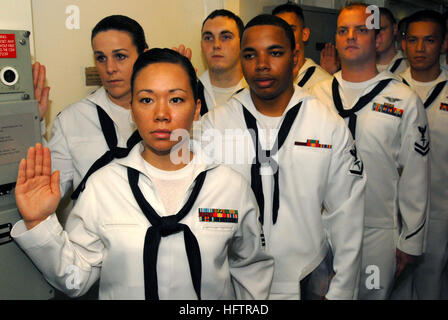 070617-N-2659P-073 PERSIAN GULF (June 17, 2007) - Hospital Corpsmen recite the medical oath in the medical ward aboard the Nimitz-class aircraft carrier USS John C. Stennis (CVN 74). Hospital Corpsman aboard Stennis celebrated their 109th birthday by honoring those who have died supporting Operations Enduring Freedom and Iraqi Freedom.  Hospital Corpsman aboard Stennis celebrated their 109th birthday by honoring those who have fallen as well as dedicating a 'wall of honor' in Stennis' medical department. U.S. Navy photo by Mass Communication Specialist 3rd Class Paul J. Perkins (RELEASED) US N Stock Photo