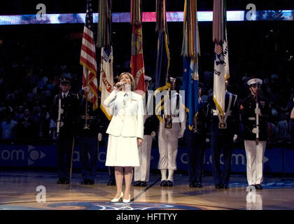 070715-N-0773H-044 WASHINGTON, D.C. (July 15, 2007) - Musician 1st Class Casey J. Elliott, soprano soloist for the ÒSea ChantersÓ chorus of the U.S. Navy Band, performs the National Anthem at the beginning of the 2007 Women National Basketball Association (WNBA) All Star Game held at the Verizon Center in Washington, D.C. U.S. Navy Photo by Chief Musician Stephen Hassay (RELEASED) US Navy 070715-N-0773H-044 Musician 1st Class Casey J. Elliott, soprano soloist for the Sea Chanters chorus of the U.S. Navy Band, performs the National Anthem Stock Photo