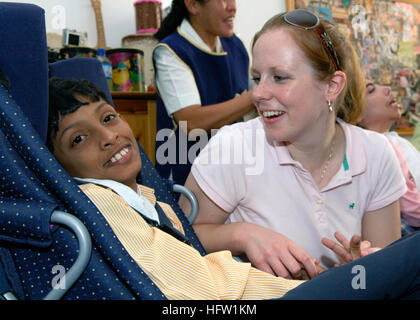 071016-N-6524M-002  DUBAI, United Arab Emirates (Oct. 16, 2007) - Hospital Corpsman 2nd Class Rita Rombaoa participates in a community relations project at the Dubai Center for Special Needs during a recent port visit by the nuclear-powered aircraft carrier USS Enterprise (CVN 65). Enterprise and embarked Carrier Air Wing (CVW) 1 are underway on a scheduled six-month deployment in support of Maritime Operations (MO). U.S Navy photo by Mass Communication Specialist Seaman Brandon Morris  (RELEASED) US Navy 071016-N-6524M-002 Hospital Corpsman 2nd Class Rita Rombaoa participates in a community r Stock Photo