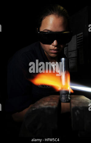 091017-N-3038W-074 INDIAN OCEAN (Oct. 17, 2009) Hull Technician Fireman Gillian Jackson brazes a pipe in the welding shop aboard the aircraft carrier USS Nimitz (CVN 68). The Nimitz Carrier Strike Group is on a routine deployment to the U.S. 5th Fleet area of responsibility. (U.S. Navy photo by Mass Communication Specialist 3rd Class John Phillip Wagner Jr./Released) US Navy 091017-N-3038W-074 Hull Technician Fireman Gillian Jackson brazes a pipe in the welding shop aboard the aircraft carrier USS Nimitz (CVN 68) Stock Photo