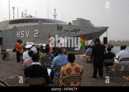 080129-N-0193M-081  LOME, Togo (Jan. 29, 2008) Cmdr. Charles Rock, commanding officer aboard the high speed vessel (HSV) 2 Swift, explains how Africa Partnership Station (APS) donated 107,000 meals to malnourished children through Project Handclasp. APS volunteers and members of Project Handclasp also donated toys and hygiene supplies to the children. During the deployment APS will donate more than 150 pallets of food, supplements, medical supplies and hygiene products those in need in West and Central Africa. U.S. Navy photo by Mass Communication Specialist 2nd Class Elizabeth Merriam (Releas Stock Photo