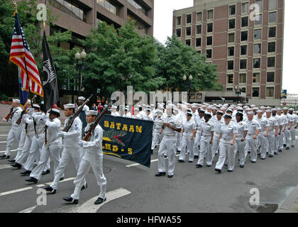 080704-N-1512O-088 BOSTON (July 4, 2008) Sailors assigned to the multi-purpose amphibious assault ship USS Bataan (LHD 5) participate in the Fourth of July parade through Boston beginning at City Hall for a flag raising ceremony and ending at the State Building for a reading of the Declaration of Independence. Bataan is in Boston participating in the 27th annual Boston Harborfest, a six-day long Fourth of July festival showcasing the colonial and maritime heritage of the cradle of the American Revolution. U.S. Navy photo by Mass Communication Specialist 3rd Class Stephen Oleksiak (Released) US Stock Photo