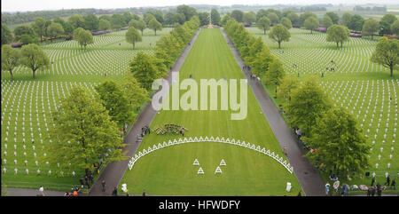 100530-N-8288P-086 MARGRATEN, Netherlands (May 30, 2010) Families visits the Netherlands American Cemetery and Memorial during the Memorial Day weekend. The cemetery was established as a battlefield cemetery on Nov. 10, 1944 by the Ninth United States Army. The cemetery interred 8,302 American soldiers who gave their lives in the airborne and ground operations to liberate eastern Holland during the advances into Germany over the Roer River and across the Rhine River, and in air operations over the region. (U.S. Navy photo by Mass Communication Specialist 2nd Class William Pittman/Released) US  Stock Photo