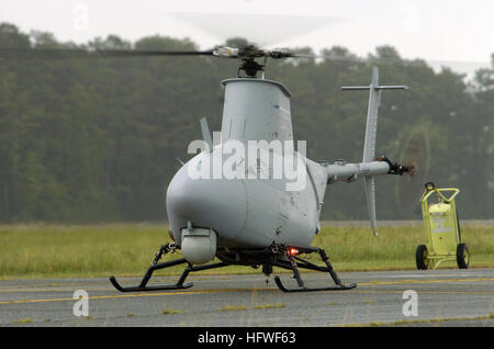 050627-N-0295M-138 St. Inigoes, Md. (June 27, 2005) Ð A RQ-8A Fire Scout Vertical Takeoff and Landing Tactical Unmanned Aerial Vehicle (VTUAV) System turns at its flight power setting prior to a flight demonstration at the 2005 Naval Unmanned Aerial Vehicle Air Demo held at the Webster Field Annex of Naval Air Station Patuxent River. Fire Scout has the ability to autonomously take off and land from any aviation-capable warship and at unprepared landing zones. With an on-station endurance of over four hours, the Fire Scout system is capable of continuous operations, providing coverage at 110 na Stock Photo