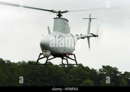 050627-N-0295M-154 St. Inigoes, Md. (June 27, 2005) Ð A RQ-8A Fire Scout Vertical Takeoff and Landing Tactical Unmanned Aerial Vehicle (VTUAV) System takes off for a flight demonstration at the 2005 Naval Unmanned Aerial Vehicle Air Demo held at the Webster Field Annex of Naval Air Station Patuxent River. Fire Scout has the ability to autonomously take off and land from any aviation-capable warship and at unprepared landing zones. With an on-station endurance of over four hours, the Fire Scout system is capable of continuous operations, providing coverage at 110 nautical miles from the launch  Stock Photo