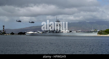 081024-N-0879R-002 PEARL HARBOR, Hawaii (Oct. 24, 2008) Two helicopters from the 'Easy Riders' of Helicopter Antisubmarine Squadron Light (HSL) 37, perform a fly-over between Kilo pier and the USS Missouri and USS Arizona Memorials at the beginning of a change of command ceremony in which Rear Adm. Townsend G. Alexander was relieved by Rear Adm. Dixon R. Smith as commander, Navy Region Hawaii and commander, Naval Surface Group Middle Pacific at Naval Station Pearl Harbor. (U.S. Navy photo by Chief Mass Communication Specialist David Rush/Released) US Navy 081024-N-0879R-002 Two helicopters per Stock Photo