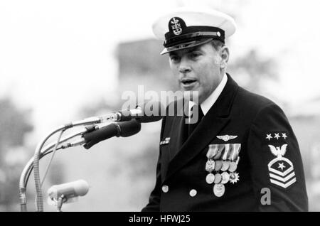 790928-N-0000X-001 WASHINGTON, D.C. (Sept. 28, 1979) In this Sept. 28, 1979 file photo, Master Chief Petty Officer of the Navy (MCPON) Thomas S. Crow delivers remarks at the ceremony marking his installation and the retirement of MCPON Robert J. Walker at Leutze Park. Crow died of cancer Sunday, Nov. 30th at his home in San Diego. He was 74.  Crow was selected for MCPON in June, 1979.  During his time in office, he was instrumental in the opening of the Navy's Senior Enlisted Academy and the re-emphasis on pride and professionalism across the Fleet. (U.S. Navy Photo/Released) US Navy 790928-N- Stock Photo