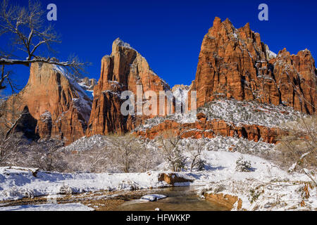 The Court of the Patriarchs with a fresh covering of snow and the North Fork of the Virgin River in Zion National Park Utah USA Stock Photo
