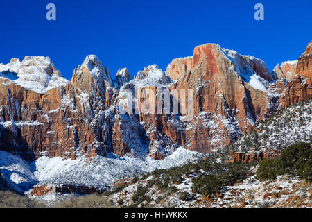 The majestic cliffs in the 'Temples and Towers' area of Zion National Park near Springdale, Utah, USA with a covering of snow. Stock Photo