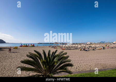 Los Cristianos promenade alongside the beach and port, Tenerife, Canary Islands, Spain Stock Photo