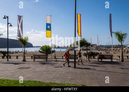 Los Cristianos promenade alongside the beach and port, Tenerife, Canary Islands, Spain Stock Photo