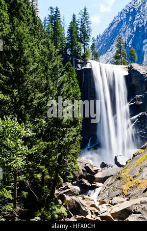 Vernal Fall is a 317 feet waterfall on the Merced River just downstream of Nevada Fall in Yosemite National Park, California. Vernal Fall, as well as Stock Photo