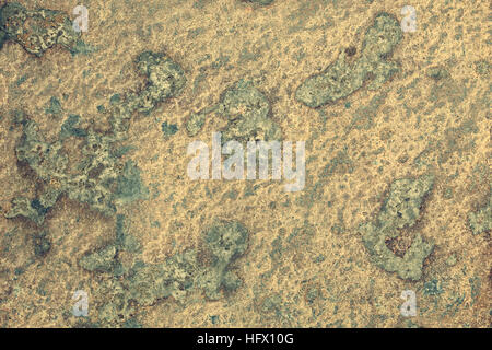 Naturally yellowish patterned slate surface for background toned (Digitally Altered: Toned Image) Stock Photo