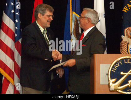 090613-N-9174G-003 ARLINGTON, Va. (June 13, 2009) The Navy League of the United States presents Capt. Richard Phillips with the Admiral Arleigh Burke Leadership Award, at the Westin Arlington Gateway. Phillips was the master of the container ship MV Maersk Alabama when Somali pirates hijacked it on April 8, 2009. Concerned for his crew, Capt. Phillips offered himself up to the pirates as a hostage in return for their release. On April 12, 2009, U.S. naval forces, including Navy SEALs, rescued Phillips from a one of the MaerskÕs lifeboats as the pirates attempted to escape. (U.S. Navy photo by  Stock Photo