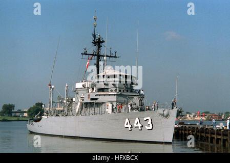 A starboard bow view of the ocean minesweeper USS FIDELITY (MSO 443) backing away from the pier after a week-long port visit to the Washington Navy Yard. USS Fidelity (MSO-443) Stock Photo