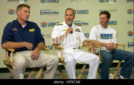 050823-N-5862D-135 Charlotte, N.C. (Aug. 23, 2005) Ð Commander, Navy Recruiting Command, Rear Adm. Dale Jeffrey Fowler and Navy NASCAR driver and team owner Dale Earnhardt Jr., right, and driver Mark McFarland, left, announce today during a press conference at Lowes Motor Speedway Charlotte, N.C., that the Navy will sponsor a new team owned by Earnhardt Jr., for the 2006 NASCAR Busch Series. The team will field a Chevrolet Monte Carlo Number 88 driven by McFarland and will carry the ÒNavy - Accelerate Your lifeÓ primary sponsor logo. U.S. Navy photo by Chief Photographer's Mate Chris Desmond ( Stock Photo