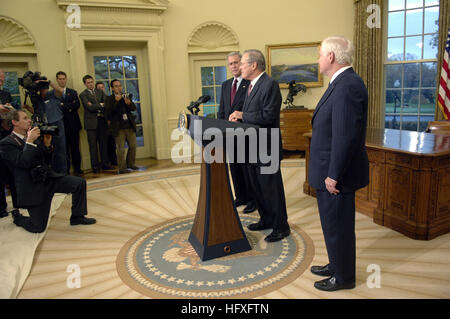 061108-F-5586B-159 President George W. Bush, and Secretary of Defense nominee Robert Gates, right, look-on as Secretary of Defense Donald H. Rumsfeld addresses the nation during a news conference from the Oval Office, shortly after the President announced his replacement. U.S. Navy photo by James Bowman (RELEASED) US Navy 061108-F-5586B-159 President George W. Bush, and Secretary of Defense nominee Robert Gates, right, look-on as Secretary of Defense Donald H. Rumsfeld addresses the nation Stock Photo