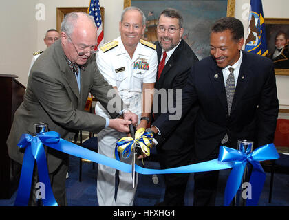 090828-O-8395K-001 ANNAPOLIS, Md. (Aug. 28, 2009) Professor J. Scott Harmon, Director of the U.S. Naval Academy Museum, Vice Adm. Jeffrey Fowler, Superintendent of the Naval Academy, retired Rear Adm. Jay DeLoach, Director of Naval Heritage and History Command, and Byron Marchant, president and CEO of the U.S. Naval Academy Alumni Association and Foundation, cut a ribbon signifying the grand reopening of the U.S. Naval Academy Museum. The museum was closed for two years while undergoing a complete renovation. (Photo by Gin Kai/Released) US Navy 090828-O-8395K-001 VIP's cut a ribbon signifying  Stock Photo