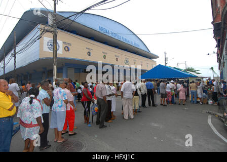 070706-N-8704K-014  COLON, Panama (July 6, 2007) - Patients line up outside the Paul Brown Arena, to receive medical care from personnel assigned to Military Sealift Command hospital ship USNS Comfort (T-AH 20). Comfort is on a four-month humanitarian deployment to Latin America and the Caribbean to provide medical treatment to patients in a dozen countries. While deployed, Comfort is under the operational control of U.S. Naval Forces Southern Command and tactical control of Destroyer Squadron (DESRON) 24. U.S. Navy photo by Mass Communication Specialist 2nd Class Joshua Karsten (RELEASED) US  Stock Photo