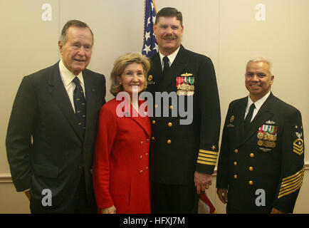 060114-N-0191T-056  Ingleside, Texas (Jan. 14, 2006) Ð From left to right, the 41st President of the United States, the Honorable George H.W. Bush, shipÕs sponsor for USS San Antonio (LPD 17) Senator Kay Bailey Hutchison (R-Tx), pose with the shipÕs Commanding Officer, Captain Jonathan M. Padfield, and Command Master Chief Willie De Santiago, during a commissioning breakfast aboard ship. As the first in her class, USS San Antonio (LPD 17) represents a key element of the NavyÕs seabase transformation. Collectively, San Antonio-class will functionally replace over 41 ships (LPD 4, LSD 36, LKA 11 Stock Photo