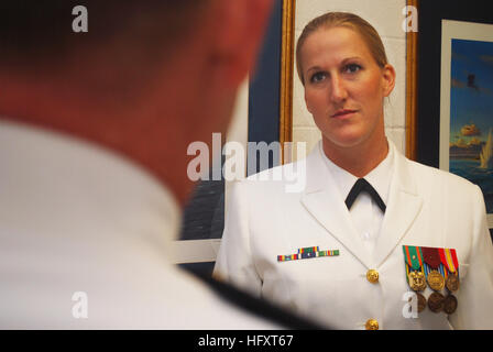 090910-N-6651N-004  JACKSONVILLE, Fla. (Sept. 10, 2009) Chief Warrant Officer Amy Blades talks with Ensign Brian Allen while waiting for the winging ceremony to start for Patrol Squadron (VP) 30 at Naval Air Station Jacksonville, Fla. Blades earned her aviator wings during the ceremony. (U.S. Navy photo by Mass Communication Specialist 1st Class Monica Nelson/Released) US Navy 090910-N-6651N-004 Chief Warrant Officer Amy Blades talks with Ensign Brian Allen while waiting for the winging ceremony to start for Patrol Squadron (VP) 30 at Naval Air Station Jacksonville, Fla Stock Photo