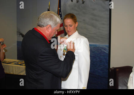 090910-N-6651N-001  JACKSONVILLE, Fla. (Sept. 10, 2009) Darrell Blades pins aviator wings on his daughter, Chief Warrant Officer Amy Blades, during the winging ceremony for Patrol Squadron (VP) 30 at Naval Air Station Jacksonville, Fla. (U.S. Navy photo by Mass Communication Specialist 1st Class Monica Nelson/Released) US Navy 090910-N-6651N-001 Darrell Blades pins aviator wings on his daughter, Chief Warrant Officer Amy Blades, during the winging ceremony for Patrol Squadron (VP) 30 at Naval Air Station Jacksonville, Fla Stock Photo