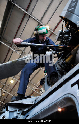 An Aviation Machinist's Mate conducts a maintenance conditional ...