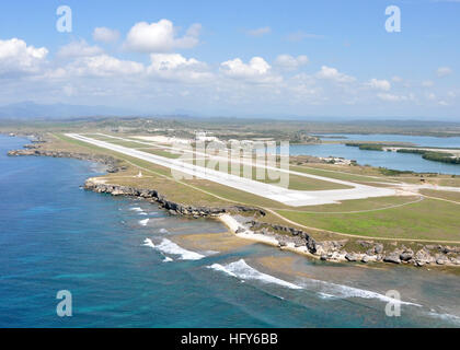100506-N-8241M-317 GUANTANAMO BAY, Cuba (May 6, 2010) An aerial view of the Leeward Airfield at Naval Station Guantanamo Bay, Cuba. Guantanamo Bay is a logistical hub for U.S. Navy, U.S. Coast Guard, U.S. Army, and allied vessels and aviation platforms operating in the Caribbean region of the U.S. 4th Fleet. (U.S. Navy photo by Chief Mass Communication Specialist Bill Mesta/Released) US Navy 100506-N-8241M-317 An aerial view of the Leeward Airfield at Naval Station Guantanamo Bay, Cuba Stock Photo