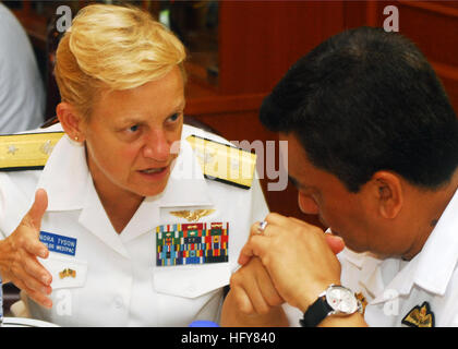 100607-N-0995C-079  LUMUT, Malaysia (June 6, 2010) Rear Adm. Nora Tyson, commander of Task Force 73, talks with Vice Adm. Jamil Osman, Royal Malaysian Navy Joint Forces Commander, at the Cooperation Afloat Readiness and Training (CARAT) Malaysia 2010 opening ceremony. CARAT is a series of bilateral exercises held annually in Southeast Asia to strengthen relationships and enhance force readiness. (U.S. Navy photo by Mass Communication Specialist 2nd Class Eric J. Cutright/Released) US Navy 100607-N-0995C-079 Rear Adm. Nora Tyson, commander of Task Force 73, talks with Vice Adm. Jamil Osman, Roy Stock Photo
