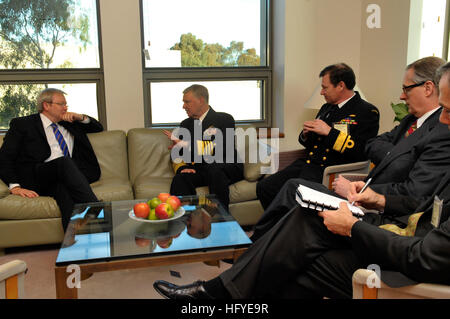100930-N-8273J-068  CANBERRA, Australia (Sept. 30, 2010) Chief of Naval Operations (CNO) Adm. Gary Roughead meets with the Honorable Kevin Rudd MP, AustraliaÕs Minister of Foreign Affairs, while visiting Canberra. Roughead is in Australia to attend the 12th Wester Pacific Naval Symposium in Sydney and visit with Sailors and leadership of the Royal Australian Navy. (U.S. Navy photo by Chief Mass Communication Specialist Tiffini Jones Vanderwyst/Released) US Navy 100930-N-8273J-068 Chief of Naval Operations (CNO) Adm. Gary Roughead meets with the Honorable Kevin Rudd MP, Australia's Minister of  Stock Photo