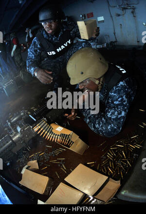 101029-N-7103C-206 PACIFIC OCEAN (Oct. 29. 2010) Aviation Boatswain's Mate (Equipment) Airman Kevin Graves, right, from Ontario, Calif., fires an M-240 machine gun during a live-fire exercise. George Washington, the Navy's only permanently forward-deployed aircraft carrier, is underway helping to ensure security and stability in the western Pacific Ocean. (U.S. Navy photo by Mass Communication Specialist David A. Cox/Released) US Navy 101029-N-7103C-206 Aviation Boatswain's Mate (Equipment) Airman Kevin Graves, right, from Ontario, Calif., fires an M-240 machine gun durin Stock Photo