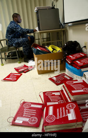 Waheed 283 U.S. Navy Chief Machinist Mate Thuc Pham, from Las Vegas, right, serves ...