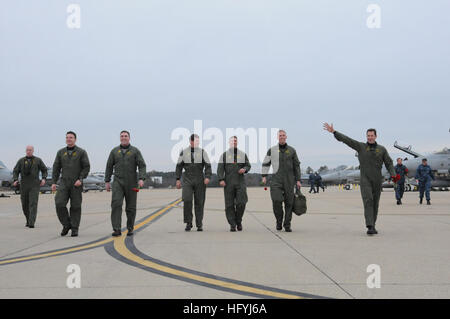 101219-N-1079B-645 VIRGINIA BEACH (Dec. 18, 2010) Pilots from Strike Fighter Squadron (VFA) 32 greet friends and family members during a homecoming ceremony at Naval Air Station Oceana. VFA-32, part of Carrier Air Wing (CVW) 3, completed a seven-month deployment aboard the aircraft carrier USS Harry S. Truman (CVN 75). During their deployment, CVW-3 provided close air support, armed overwatch, electronic warfare, and intelligence, surveillance, and reconnaissance over Afghanistan in support of operations Enduring Freedom and New Dawn. (U.S. Navy photo by Mass Communication Specialist 3rd Class Stock Photo