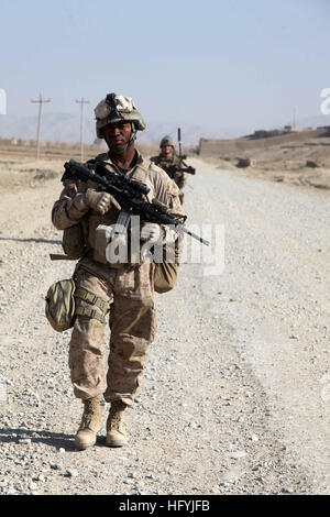 110113-M-6340O-014 SANGIN, Afghanistan (Jan. 13, 2011) Hospitalman Rashad Collins, assigned to 1st Platoon, Kilo Company, 3rd Battalion, 5th Marine Regiment, Regimental Combat Team 2, conducts a security patrol. The Marines conduct daily security patrols to decrease enemy presence in the surrounding area. The 5th Marine Regiment is deployed in Helmand Province to support the International Security Assistance Force. (U.S. Marine Corps photo by Lance Cpl. Jorge A. Ortiz/ Released) US Navy 110113-M-6340O-014 Hospitalman Rashad Collins, assigned to 1st Platoon, Kilo Company, 3rd Battalion, 5th Mar Stock Photo
