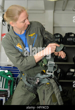 A pilot from Fleet Composite Squadron (VC) 13 performs a preflight ...