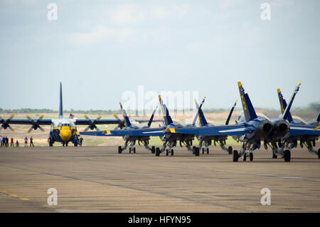 110324-N-RY232-008 MERIDIAN, Miss. (March 24, 2011) Boeing F/A-18 Hornets assigned to the U.S. Navy flight demonstration squadron, the Blue Angels, taxi past Fat Albert, a C-130 Hercules, at Naval Air Station (NAS) Meridian. The Blue Angels performed at NAS Meridian as part of the 2011 show season. (U.S. Navy photo by Mass Communication Specialist 3rd Class Julia A. Casper/Released)a US Navy 110324-N-RY232-008 Boeing F-A-18 Hornets taxi past Fat Albert at Naval Air Station (NAS) Meridian Stock Photo