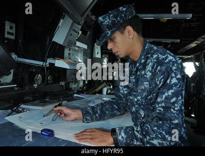 110509-N-NL541-086 ATLANTIC OCEAN (May 9, 2011) Quartermaster Seaman Ephrain Rivera, assigned to the guided-missile frigate USS Thach (FFG 43), performs nautical chart corrections while Thach is anchored off the coast of Rio Grande, Brazil. Thach is participating in the Atlantic phase of UNITAS 52 with the U.S. Coast Guard, and navies from Brazil, Mexico, and Argentina. (U.S. Navy photo by Mass Communication Specialist 3rd Class Stuart Phillips/Released) US Navy 110509-N-NL541-086 Quartermaster Seaman Ephrain Rivera, assigned to the guided-missile frigate USS Thach (FFG 43), performs nautical  Stock Photo