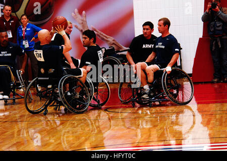 110519-N-CD297-046 COLORADO SPRINGS, Colo. (May 19, 2011) Logistics Specialist 1st Class Robert Lipscomb, a member of Team Navy/Coast Guard, takes a shot against the Army Team in a preliminary game of wheelchair basketball at the second annual Warrior Games at the Olympic Training Center. Warrior Games is a Paralympic-style sport event among 200 seriously wounded, ill, and injured service members from the Army, Navy, Air Force, Marine Corps, and Coast Guard. (U.S. Navy photo by Mass Communication Specialist 1st Class Andre N. McIntyre/Released) US Navy 110519-N-CD297-046 Logistics Specialist 1 Stock Photo