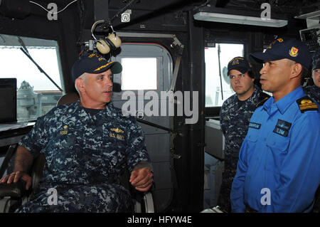 110610-N-SP676-308 SOUTH CHINA SEA (June 10, 2011) Cmdr. Donald Foss, commanding officer of the guided-missile frigate USS Ford (FFG 54), speaks with Royal Malaysian Navy Lt. Hassim Syahrum about his experiences in the service.  Ford is taking part in Cooperation Afloat Readiness and Training (CARAT) Malaysia 2011 and is at sea with ships from the Royal Malaysian navy. (U.S. Navy photo by Mass Communication Specialist 3rd Class Brian A. Stone/Released) US Navy 110610-N-SP676-308 Cmdr. Donald Foss, commanding officer of the guided-missile frigate USS Ford (FFG 54), speaks with Royal Malaysian N Stock Photo