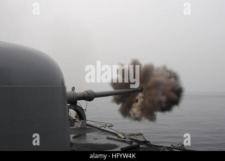 110610-N-SP676-307 SOUTH CHINA SEA (June 10, 2011) The guided-missile frigate USS Ford (FFG 54) fires its MK 75 76mm/3-inch gun at a target during a Cooperation Afloat Readiness and Training (CARAT) 2011 gunnery exercise. (U.S. Navy photo by Mass Communication Specialist 3rd Class Brian A. Stone/Released) US Navy 110610-N-SP676-307 The guided-missile frigate USS Ford (FFG 54) fires its MK 75 76mm-3-inch gun at a target during a Cooperation Afloat Rea Stock Photo