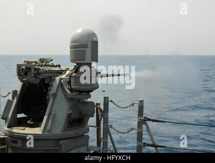 110706-N-YM590-134 GULF OF ADEN (July 6, 2011) An MK-38 25 mm machine gun fires during a weapons live-fire exercise aboard the guided-missile cruiser USS Anzio (CG 68). Anzio is assigned to Combined Task Force 151, a multi-national, mission-based task force established by the Combined Maritime Forces in January 2009 to conduct counter-piracy operations in the Red Sea, Gulf of Aden, Somali Basin and Arabian Sea. (U.S. Navy photo by Mass Communication Specialist 2nd Class Brian M. Brooks/Released) US Navy 110706-N-YM590-134 An MK-38 25 mm machine gun fires during a weapons live-fire exercise abo Stock Photo