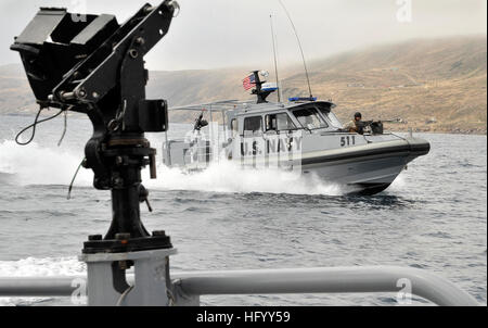 110719-N-NX238-014 SAN CLEMENTE ISLAND, Calif. (July 19, 2011) Sailors assigned to Maritime Expeditionary Security Squadron (MSRON) 11 conduct patrol boat maneuvers on a 34-foot Sea Ark Dauntless tactical craft off San Clemente Island during ULTRA 2011.  ULTRA is a two-week exercise focusing on expeditionary warfare skill qualifications and battle readiness to prepare for deployments. (U.S. Navy photo by Mass Communication Specialist 2nd Class Noel L. Danseco/Released) US Navy 110719-N-NX238-014 Sailors assigned to Maritime Expeditionary Security Squadron (MSRON) 11 conduct patrol boat maneuve Stock Photo