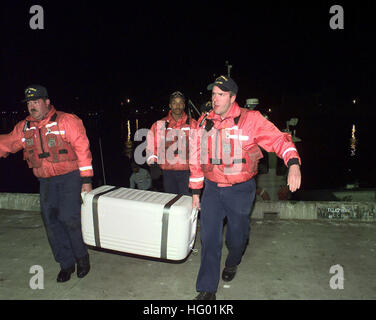 USCGS Conifer (WLB 301) personnel deliver recovered flight data recorders from Alaska Airlines Flight 261 to NTSB and FBI at Naval Construction Battalion Center, Port Hueneme, California. Stock Photo
