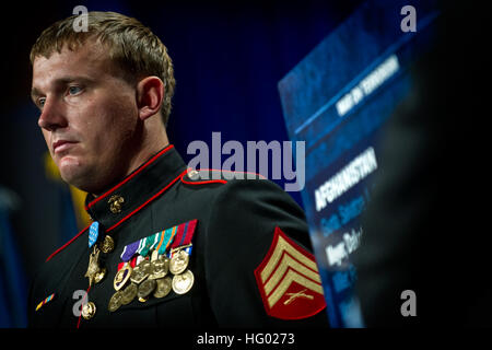 110914-N-UH963-178 WASHINGTON (Sept. 16, 2011) Medal of Honor recipient U.S. Marine Corps Sgt. Dakota Meyer stands at attention while his award citation is read during an induction ceremony at the Hall of Heroes in the Pentagon. Meyer was awarded the Medal of Honor for actions in Afghanistan on Sept. 8, 2010. Meyer saved 13 U.S. Marines and Soldiers and 23 Afghans. (U.S. Navy photo by Mass Communication Specialist 1st Class Kevin S. O'Brien/Released) US Navy 110914-N-UH963-178 Medal of Honor recipient U.S. Marine Corps Sgt. Dakota Meyer stands at attention while his award citation is read duri Stock Photo